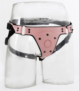 Alone harness Harness Gode-ceinture Pink Pants Rose This accessory is a harness to wear a dildo. It consists of the central part