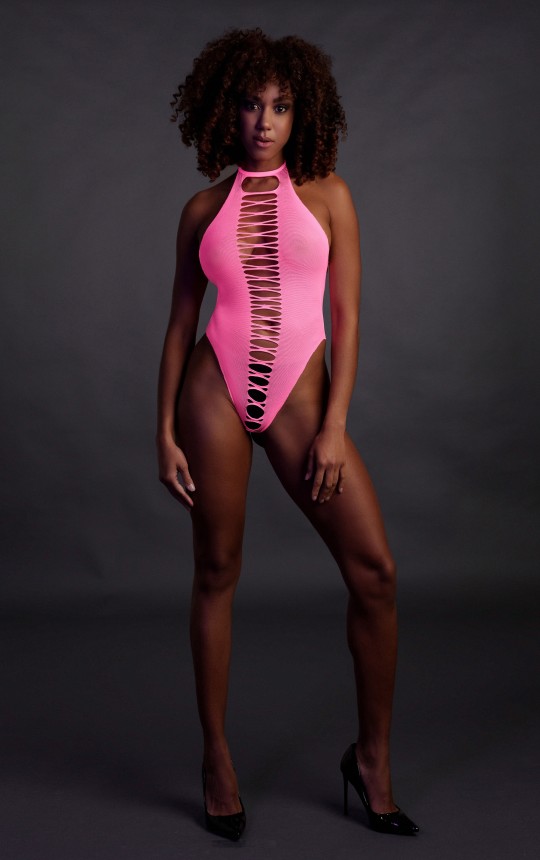 Body and Harness Body shank open to the crotch with bare back Rose Fluo Material that reacts to UV light. Composition : 92% Poly